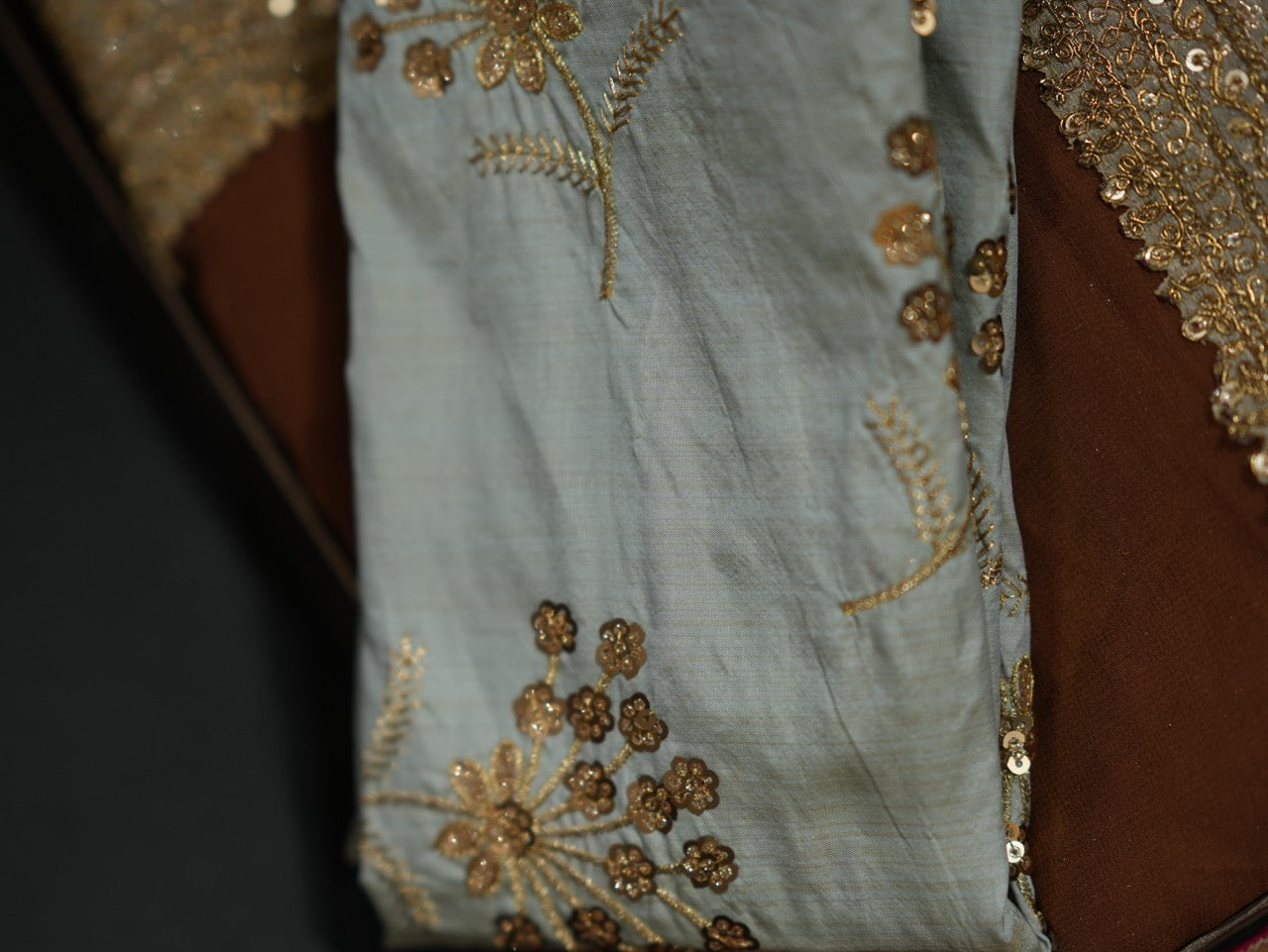 Dharani: Brown Georgette Saree with Steel Blue Raw Silk Blouse