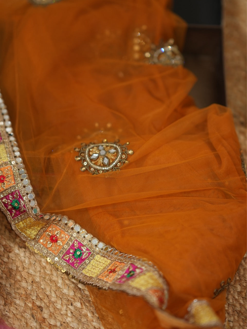 Katrina: Orange Soft Net Saree with Hand work and Multi Colour Pure Georgette Blouse