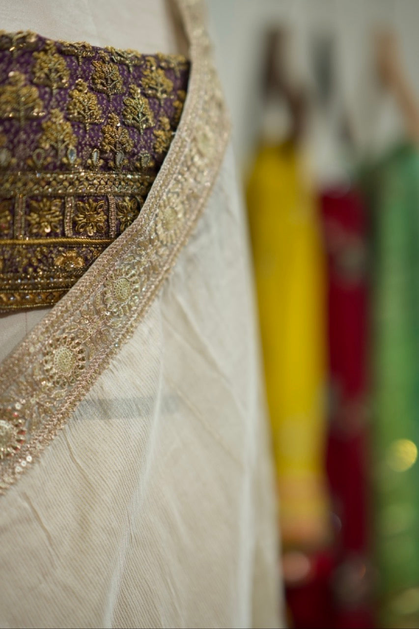 Orchid: Pure Off White Tissue Chiffon Saree with Purple Handwoven Blouse with Handwork