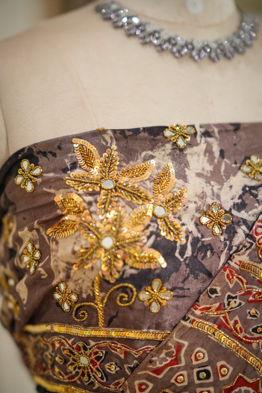 SAEBA: Brown Authentic Handblock Print Ajrakh Saree on Modal Satin with handwork on Saree and Blouse