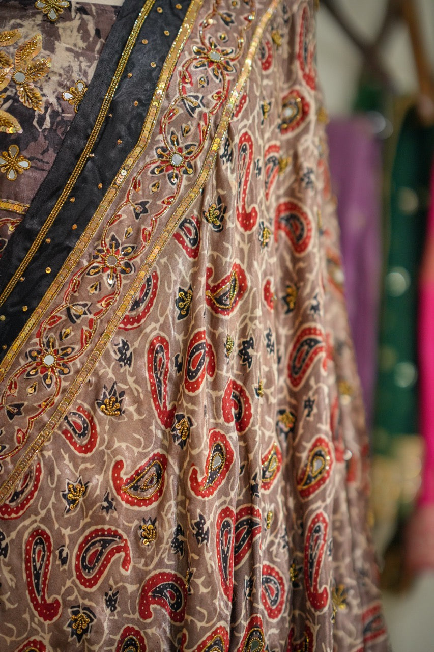 SAEBA: Brown Authentic Handblock Print Ajrakh Saree on Modal Satin with handwork on Saree and Blouse