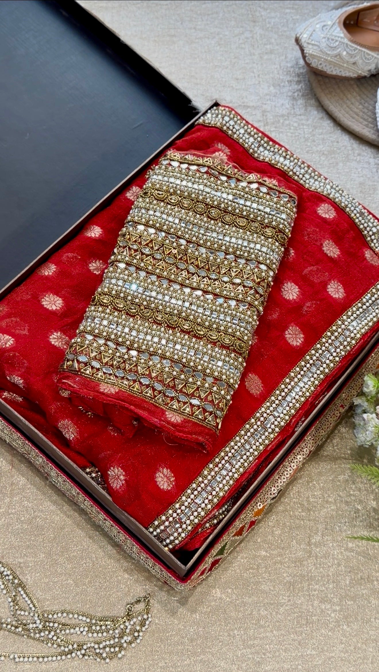 Gul: Red Jute Jacquard Saree with handwork paired with self blouse