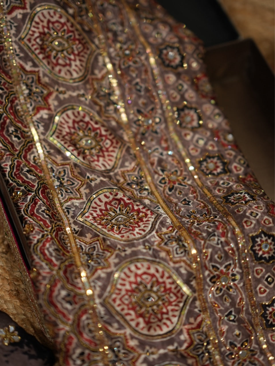 SAEBA: Brown Authentic Handblock Print Ajrakh Saree on Modal Satin with handwork on Saree and Blouse