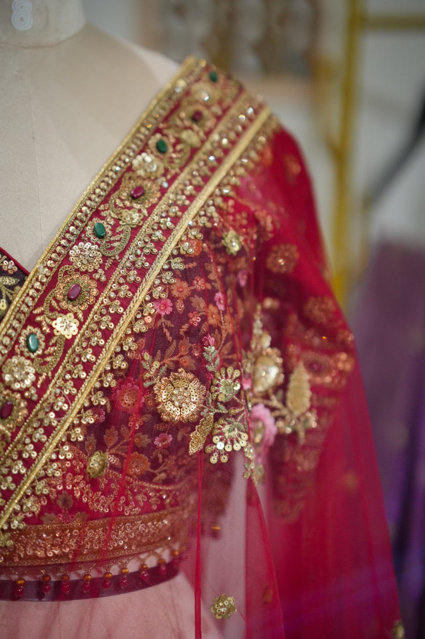 Red Bouquet : Red Softnet saree with handwork and multi fabric handwork blouse
