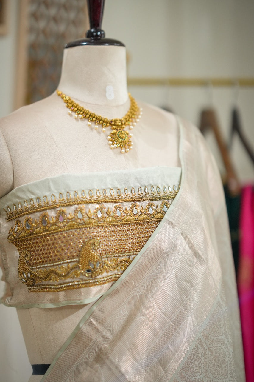 Chandrani: Pale Mint Handwoven Kanjeevaram Saree with Handwork on Blouse