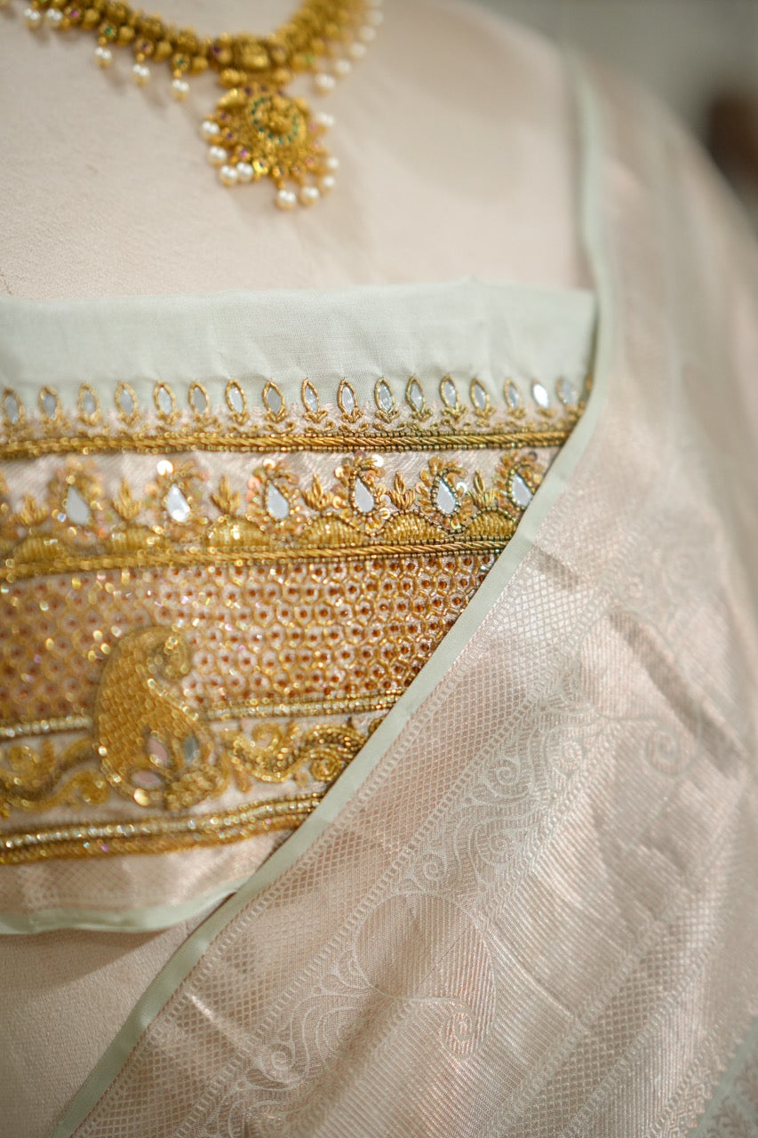 Chandrani: Pale Mint Handwoven Kanjeevaram Saree with Handwork on Blouse