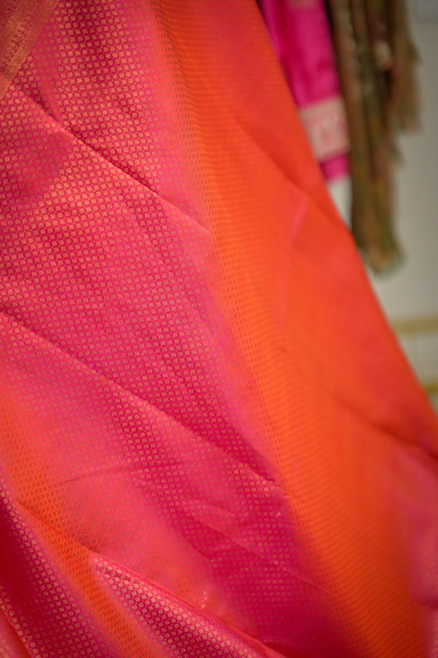 Kaveri: Pink Orange Dual Shade Handwoven Pure Silk Tissue Kanjeevaram Saree with Handwork on Blouse