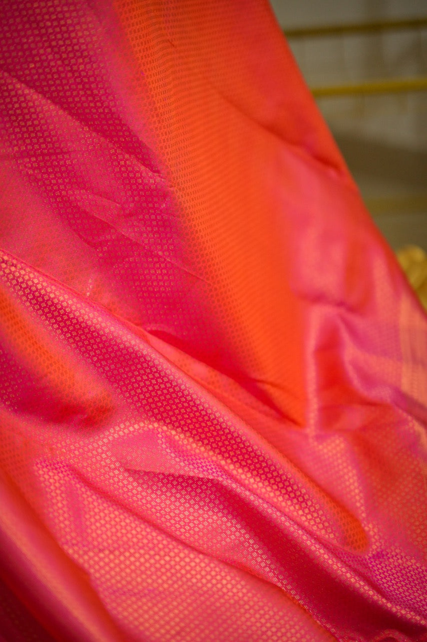 Kaveri: Pink Orange Dual Shade Handwoven Pure Silk Tissue Kanjeevaram Saree with Handwork on Blouse