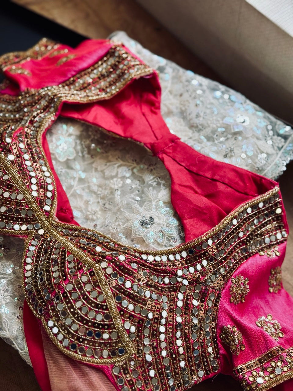 Fizaa: White SoftNet Saree paired with Pink Raw Silk Handwork Blouse.