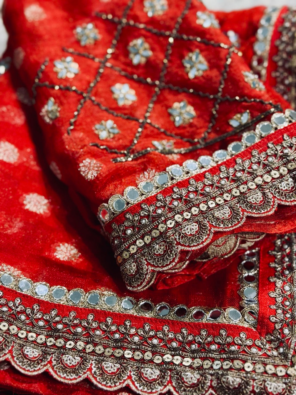 Suhagan: Red Jute Jacquard Saree with Handwork paired with a self blouse